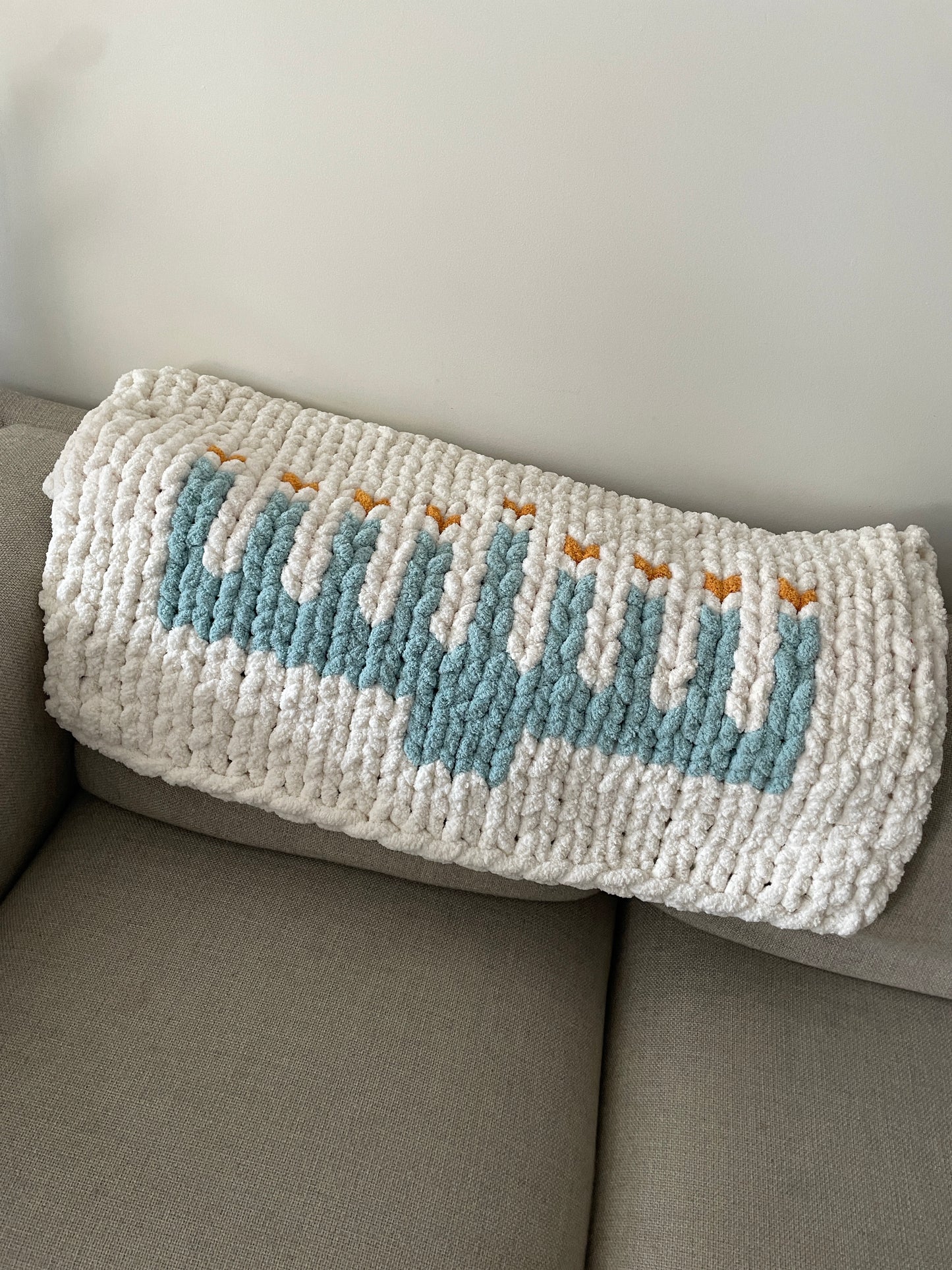 Healing Hand, Chunky Knit Blankets | Chanukah Menorah Lapghan
