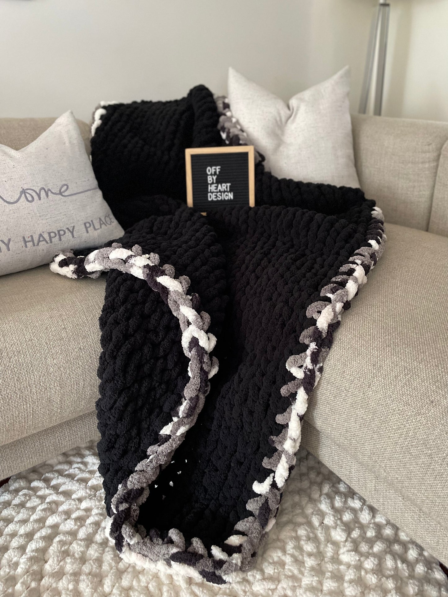 Healing Hand, Chunky Knit Blankets Black with Camo Edge