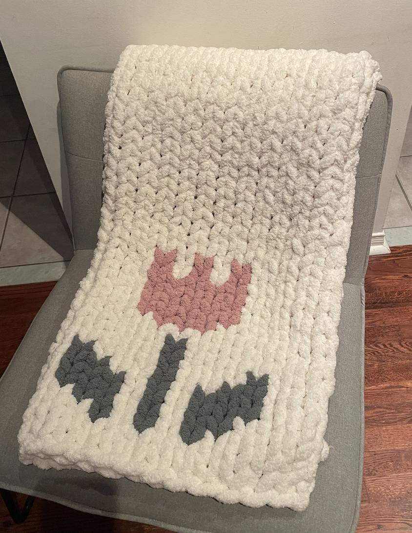Tulip baby blanket in chalk pink, vintage white and moss green chunky chenille - finished blanket from the finger knitting pattern